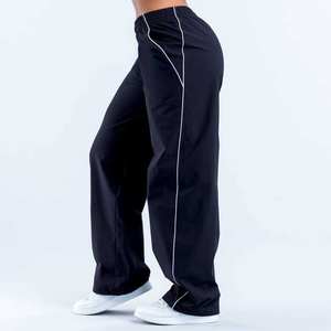Pantalons de survêtement larges pour femmes avec logo personnalisé 2025, bordures contrastées, nylon tissé léger, séchage rapide, pantalons de sport d'entraînement - Product Image 6