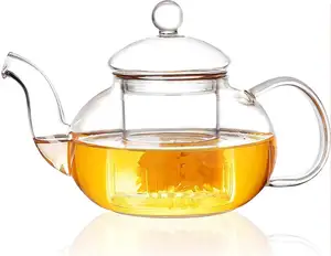 إبريق شاي آمن وشفاف على سطح الموقد مع جهاز إينفوسير قابل للإزالة ، وأوراق فضفاضة وصانعة شاي تتفتح