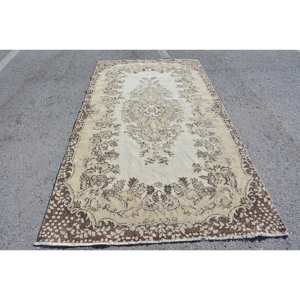 พรมสไตล์ตุรกีวินเทจขน5x9.5ft ทอแบบแบนมีลวดลายปะติดสำหรับตกแต่งห้องนั่งเล่นสีน้ำตาลเบจ - Product Image 1