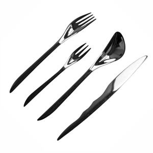 Meilleur ensemble de 4 couverts en acier inoxydable de style américain écologique avec poignées noires couleur argent de luxe - Product Image 1