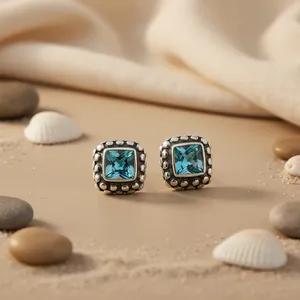 Boucles d'oreilles clous en topaze bleue religieuse plaquées rhodium pour femmes, à porter au quotidien et en cadeau - Product Image 2