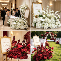 Zuiver witte bloemenkrans bruiloft welkomstbord entree decoratie