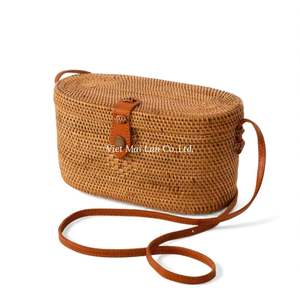 Handcrafted Rattan <b>Bag</b> with <b>String</b> Closure and Shoulder Strap Earthy Texture Designed for Simple Style and Daily Convenience - Product Image 2
