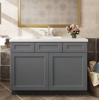Meuble-lavabo de salle de bain moderne gris en bois massif avec un seul lavabo, tiroirs à queue de pie et portes à fermeture douce, idéal pour les hôtels (vente en gros)