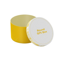 Boîte cadeau ronde rigide recyclable avec logo personnalisé en relief et laminage mat pour bouteilles cylindriques et emballage de crème pour les yeux