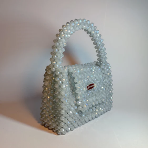 Iridescent clear crystal beaded square <b>mini</b> <b>tote</b> <b>bag</b> with a rounded handle and subtle closure detail, at wholesale prices. - Product Image 1
