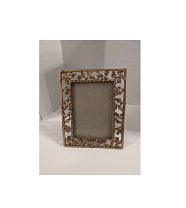 Designer inspired metal <b>photo</b> <b>frame</b> enhancing room decor with tasteful presentation of cherished photographs - Product Image 1
