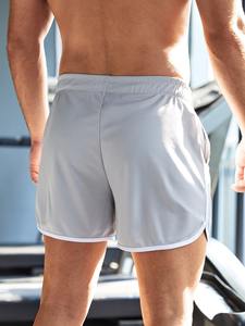 Pantalones cortos deportivos informales sólidos de malla para gimnasio para hombre, pantalones cortos deportivos de talla grande para correr, atletismo, fitness, playa, baloncesto, servicio OEM - Product Image 2