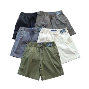 Usine chinoise Shorts décontractés respirants tissés de haute qualité pour hommes, Shorts d'entraînement unis à coupe ample pour l'extérieur, Shorts à vocation solide - Product Image 1