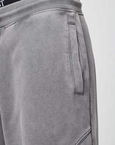 กางเกงจ็อกเกอร์ผ้าฟลีซซับในแบบเป็นมิตรกับสิ่งแวดล้อม ล้างสีแบบ Acid Wash ผ้าฝ้ายเนื้อหนา รับผลิตแบบ OEM ขายส่ง กางเกงจ็อกเกอร์ผู้ชายแบบฟอกสี - Product Image 4