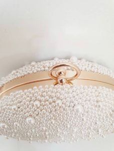 2023เงื้อมมือจัดงานแต่งงานสีขาวมุกสำหรับผู้หญิงที่มีห่วงโซ่ที่ถอดออกได้ - Product Image 2