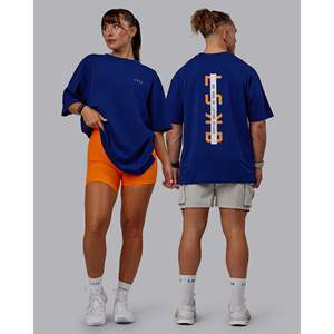 เสื้อยืดโอเวอร์ไซส์ ยูนิเซ็กส์ FLXCotton สีน้ำเงินมิดไนท์บลูและสีส้มสดใส พิมพ์ลายซิลค์สกรีน 220gsm - Product Image 1