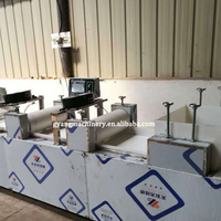 Extrudeuse de barre de sucrerie d'arachide Chikki faisant la ligne de production de nougat d'arachide de machine
