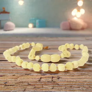 Winzige Wachschutzhülle bernsteinfest knotenförmig Baby-Zähne-Halsband sanfte Linderung, handgefertigt mit Liebe, sicherstellung der Sicherheit für Kinder ab 36 Monaten