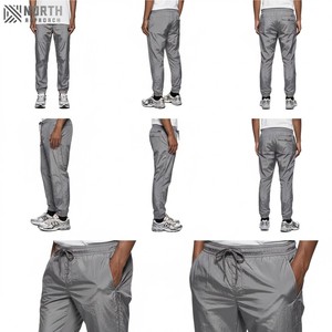 Venta al por mayor pantalones elásticos de gimnasio pista Joggers hombres cortavientos personalizado pantalones de nylon arrugado para los hombres trabajo pantalones de invierno hombres - Product Image 2