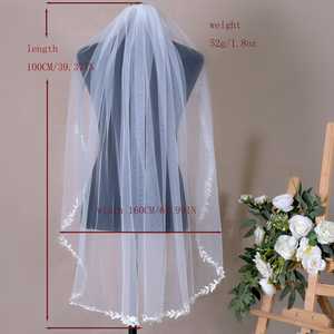 ผ้าคลุมหน้าเจ้าสาว Bridella BV129-WY1 สีไอวอรี่ ชั้นเดียว แต่งขอบลูกไม้ ปักลายอย่างนุ่มนวล ขนาด 100x160 ซม. พร้อมหวีติดผม อุปกรณ์ประกอบฉากถ่ายภาพ - Product Image 4