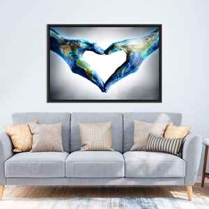 Impresión en lienzo Love Planet: obra de arte moderna con manos en forma de corazón, lienzo con marco negro - Product Image 1