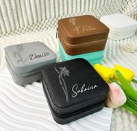 Portable Logo Personnalisé En Relief Imprimé Petit Voyage Bijoux Organisateur Carré En Cuir Fermeture À Glissière Anneau Boucle D'oreille Collier Boîtes