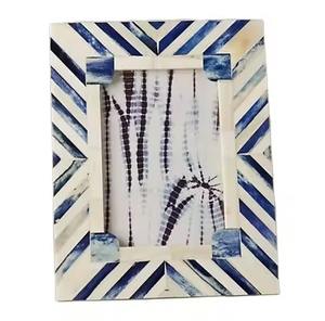 Cadre photo rond en résine artisanal avec incrustation d'os - Product Image 5