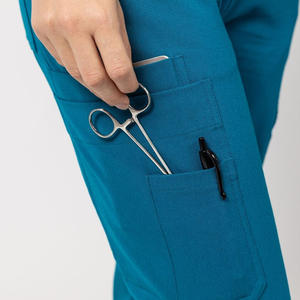 Pantalon de gommage sur mesure pour femmes Bas uniformes confortables et élégants avec options de logo personnalisé pour cliniques et hôpitaux - Product Image 2