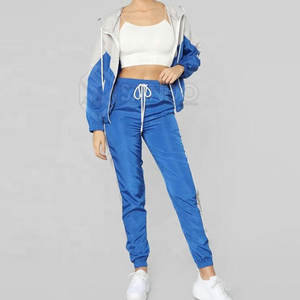 Conjunto cortavientos con cremallera para mujer diseño personalizado conjunto cortavientos de peso ligero conjunto cortavientos de invierno - Product Image 1