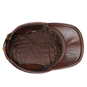 Vente en gros 2024 Nouveau bonnets en cuir de vachette de haute qualité Chaud Hiver Automne Cap Oreilles Mode Casual Lettre Design pour Hommes Femmes - Product Image 2