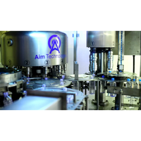Machine de remplissage automatique de bouteilles en acier inoxydable Aim Tech pour ligne de production de boissons et d'eau pure, 24-200 BPM, contrôle PLC
