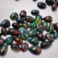 2025 attrayant naturel éthiopien opale Cabochon lisse poli noir opale de feu pierre précieuse belle forme pierres précieuses en vrac mélange pierre