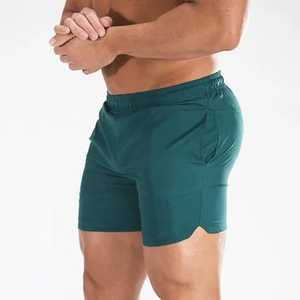 Pantalones cortos de estilo callejero para hombre con logotipo personalizado, transpirables, 100% de algodón, cintura media, teñidos lisos con bolsillos para correr - Product Image 2