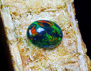 อัญมณีโอปอลสีดําเอธิโอเปียที่น่าทึ่ง อัญมณีขัดเงางามเรียบ หลวมหินโอปอลสีดํา โอปอลสีเขียวหน้าโพง - Product Image 4