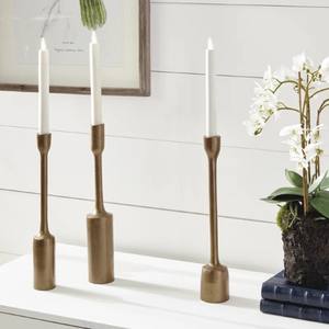 Los soportes cónicos se muestran en la imagen de decoración del hogar. Estos soportes cuentan con un diseño moderno y elegante con un metálico. - Product Image 1