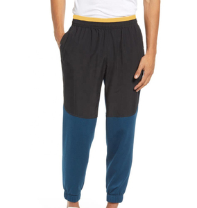 Pantalons de survêtement slim pour hommes, vêtements décontractés à la mode avec un design unique Vente à chaud en gros de pantalons non tissés - Product Image 1