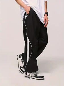 Nuevos pantalones cortavientos transpirables a rayas laterales para hombre, pantalones de secado rápido de verano informales para correr, pierna ancha con cordón, ligeros y holgados - Product Image 5