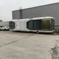 Minuscule Maison capsule en acier de luxe Mini villa préfabriquée avec remorque de bateau pour hôtel de villégiature ou jardin Espace modulaire