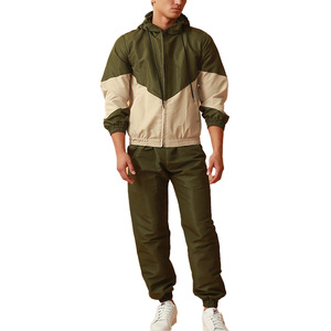 Ensemble de piste coupe-vent de sport de haute qualité pour hommes ensemble coupe-vent personnalisé à motif solide OEM personnalisable - Product Image 1