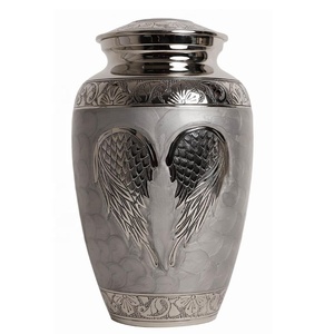 Brass wings of Freedom Engraved Adult Cremation <b>Urns</b> for Human Ashes Remains Manufacturer and Supplier From India - Product Image 2