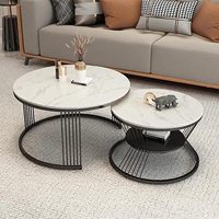 Table basse moderne à plateau en marbre et structure en acier inoxydable noir thermolaqué, mobilier de maison et d'appartement pour hall d'entrée