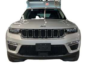 Grand Cherokee 4xe 4WD hybride 2024 d'occasion avec sièges en cuir foncé, pneus R19 et conduite à gauche - Product Image 6