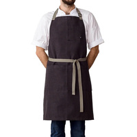 Tablier de chef au design classique fabriqué à partir de tissu de haute qualité qui résiste aux taches et permet une utilisation durable dans n'importe quel cadre culinaire