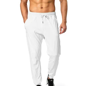 Düz beyaz renk erkek koşu pantolonu yüksek kaliteli ter pantolon erkekler Jogger pantolon rahat sokak giyim Jogger pantolon tedarikçisi