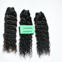 Extensions de cheveux humains du Temple indien bouclés de couleur noire naturelle vierge 100%