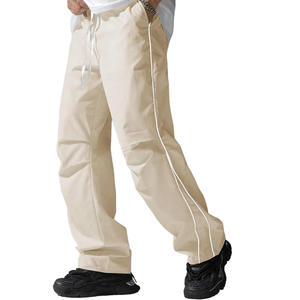 Pantalon coupe-vent avec logo personnalisé Pantalon léger, respirant et imperméable pour l'entraînement sportif, le fitness en plein air et l'utilisation décontractée - Product Image 1