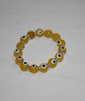 Bracelet en cristal de guérison de perles de pierres précieuses d'oeil jaune de qualité supérieure de 8mm, bracelet en perles de pierres précieuses de mauvais œil rouge bracelet perlé fait à la main