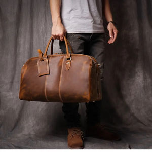 2025 nueva tendencia bolsa de lona de viaje redonda grande multifuncional impermeable cuero genuino estilo de moda moderno - Product Image 3