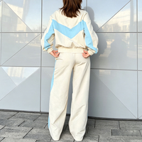 Ensemble coupe-vent femme 2026 personnalisé avec logo, blocs de couleur, broderie de haute qualité, veste de course zippée ample et pantalon de jogging, ensemble 2 pièces