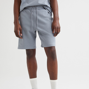 Short décontracté en coton unisexe pour hommes et femmes, pantalon chaud d'été ample et fin, short de sport en maille pour le basket-ball, couleurs unies - Product Image 3