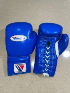 Fabrication OEM de gants de boxe en cuir de qualité supérieure, 100% cuir de vache véritable, à lacets, bleus, gants de boxe Winning - Product Image 5