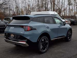 Kia Sportage hybride SX-Prestige AWD 2026 bleu éclatant, voiture d'occasion avec toit ouvrant, démarrage à distance, sièges en cuir, transmission automatique, jantes en alliage - Product Image 4