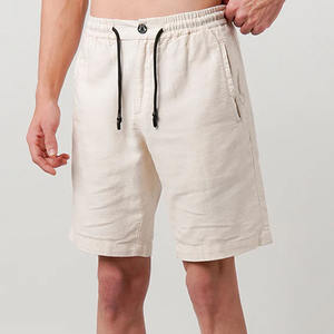 กางเกงขาสั้นผ้าฝ้ายสไตล์สตรีทสำหรับผู้ชายกางเกงขาสั้นผ้าคอตตอนแบบปรับแต่งได้ลายพื้นปิดเอวยางยืดทำจากปากีสถาน - Product Image 1