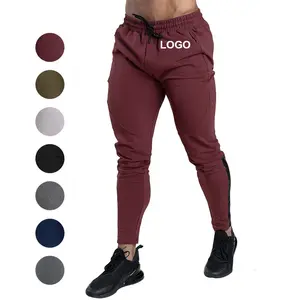 กางเกงยืดผ้าไอซ์ซิลค์สำหรับผู้ชายกางเกงกีฬาขาตรงเอวหลวมระบายอากาศได้ดีสีพื้นกางเกงกีฬาบาง